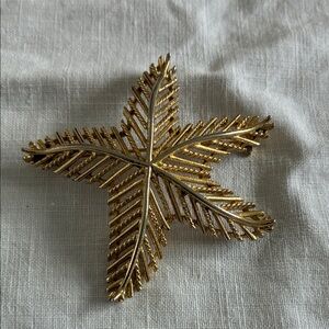 Elegant Gold Starfish Brooch